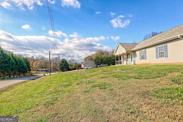 view of yard featuring a porch