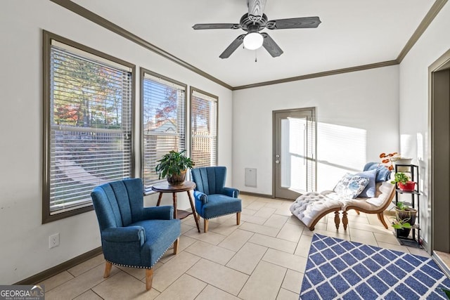 sitting room featuring ceiling fan, ornamental molding, and light tile patterned flooring