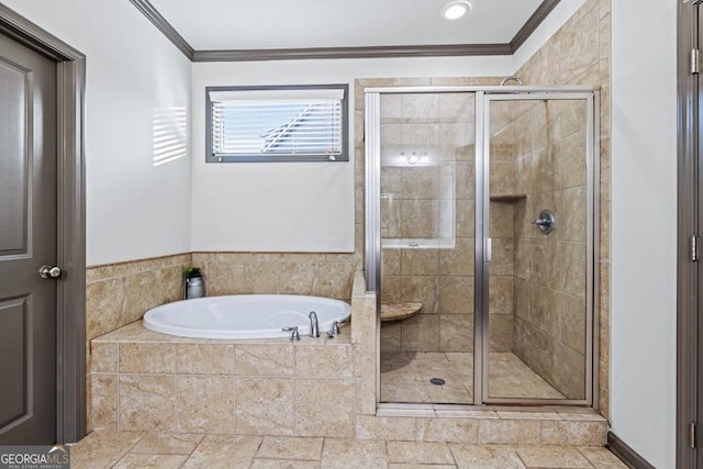 bathroom with ornamental molding and plus walk in shower