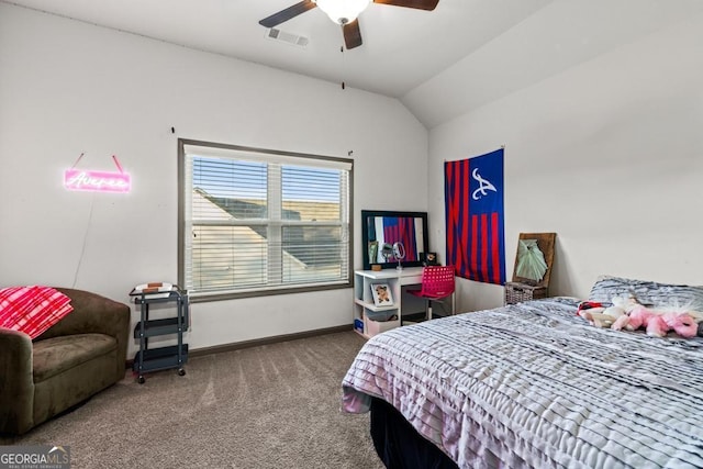 carpeted bedroom featuring vaulted ceiling and ceiling fan