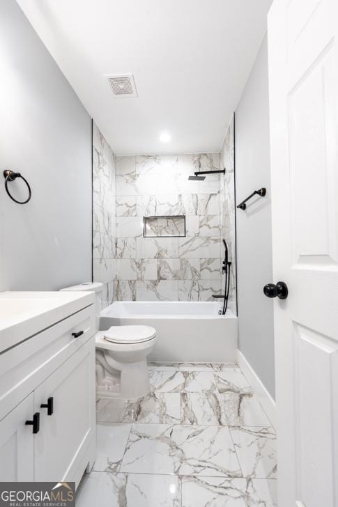 full bath featuring visible vents, toilet, marble finish floor, vanity, and shower / bathing tub combination