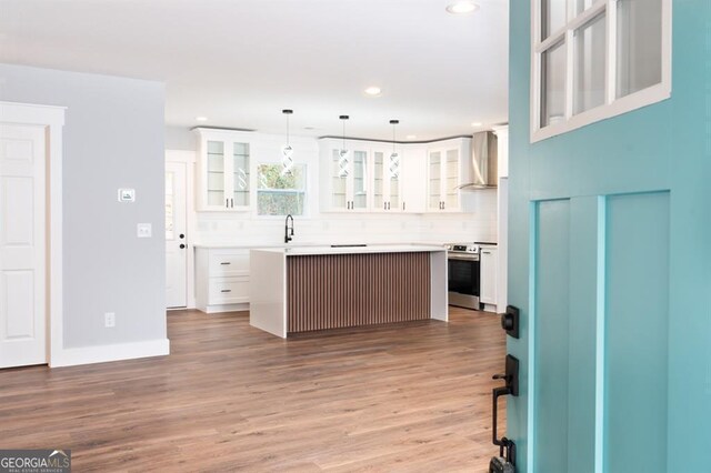 unfurnished bedroom with a closet and wood-type flooring