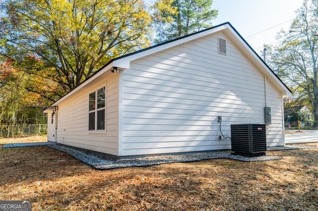 view of home's exterior featuring central AC