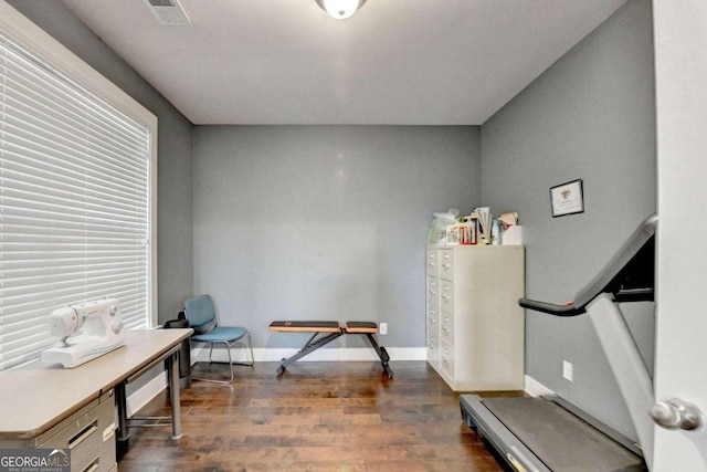 workout area with dark hardwood / wood-style flooring