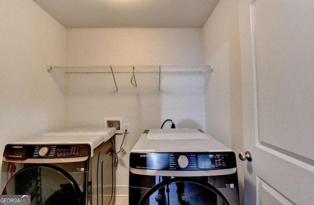 laundry area featuring separate washer and dryer