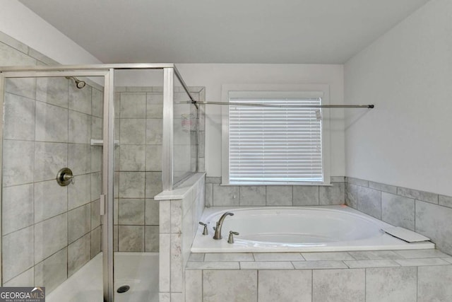 bathroom featuring plus walk in shower