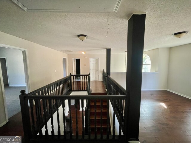 1529 Evergreen Hollow Ln, Conyers, GA 30012 - stairs featuring attic access, baseboards, and a textured ceiling