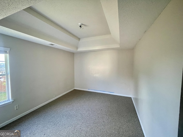 1529 Evergreen Hollow Ln, Conyers, GA 30012 - carpeted spare room featuring baseboards, healthy amount of natural light, and a textured ceiling