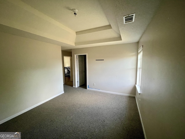 1529 Evergreen Hollow Ln, Conyers, GA 30012 - unfurnished room with baseboards, carpet flooring, and a tray ceiling