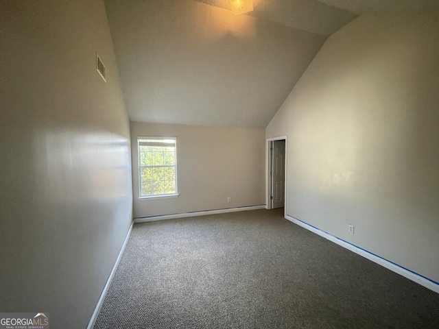 1529 Evergreen Hollow Ln, Conyers, GA 30012 - carpeted spare room featuring vaulted ceiling and baseboards