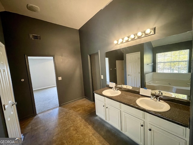 1529 Evergreen Hollow Ln, Conyers, GA 30012 - bathroom with a garden tub, double vanity, and high vaulted ceiling