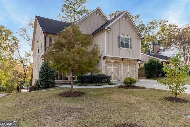 view of front facade featuring a front yard and a garage