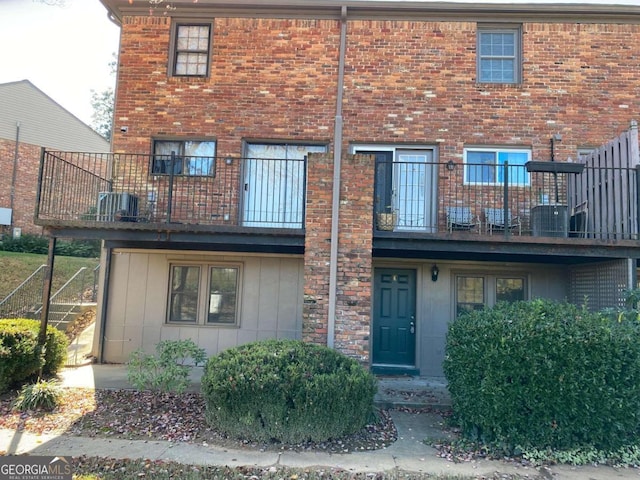 rear view of house with a balcony