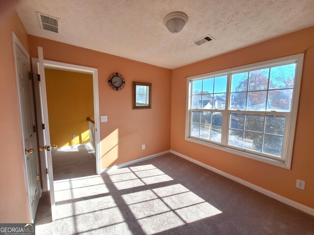 full bathroom featuring vanity, shower / tub combination, a textured ceiling, and tile patterned floors