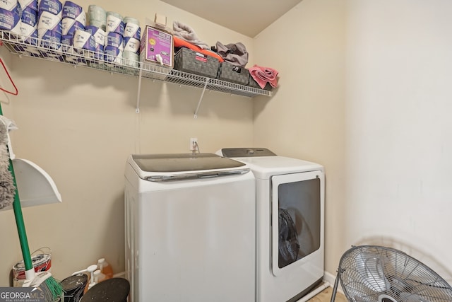 clothes washing area with washer and dryer