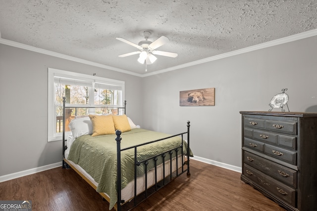 bedroom with a textured ceiling, ceiling fan, crown molding, and dark wood-type flooring