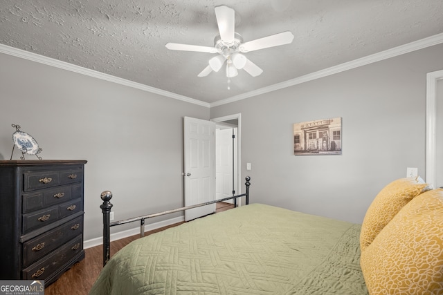 bedroom featuring a textured ceiling, dark hardwood / wood-style flooring, ceiling fan, and crown molding