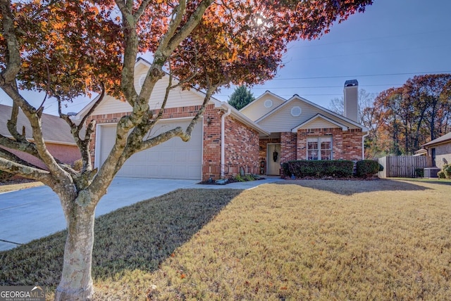 view of property with central AC, a front lawn, and a garage