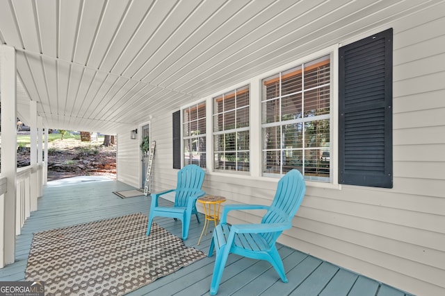 deck featuring covered porch