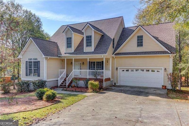 view of front of house featuring covered porch and a garage