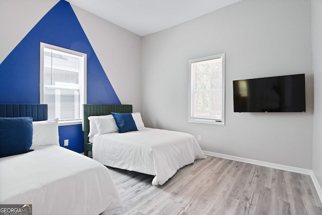 bedroom featuring light hardwood / wood-style flooring