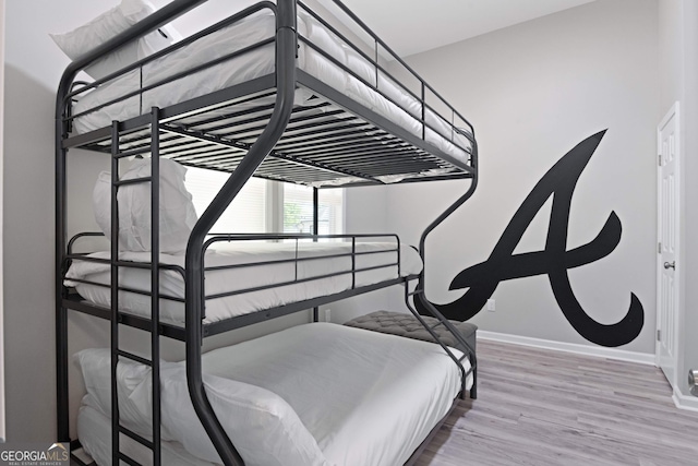 bedroom with wood-type flooring