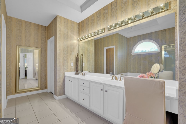 bathroom featuring tile patterned floors and vanity