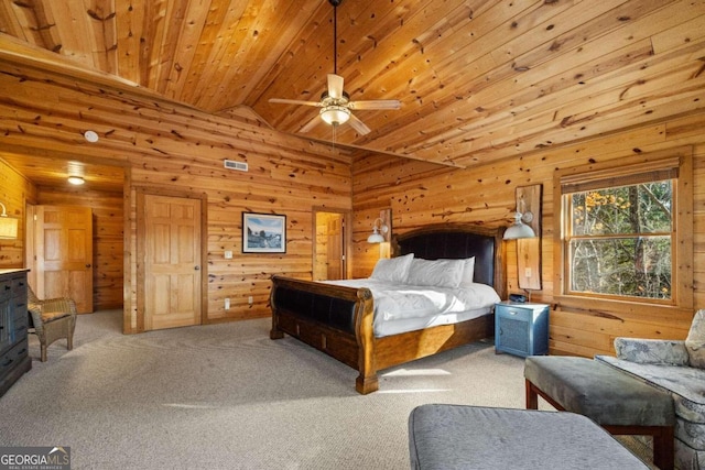 bedroom with carpet, wooden ceiling, wooden walls, ceiling fan, and beamed ceiling