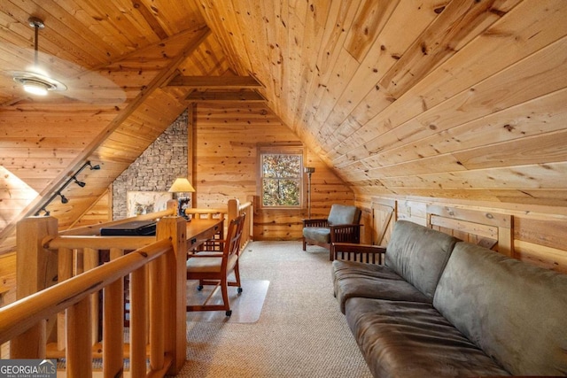 carpeted office featuring wood walls, rail lighting, wood ceiling, and vaulted ceiling