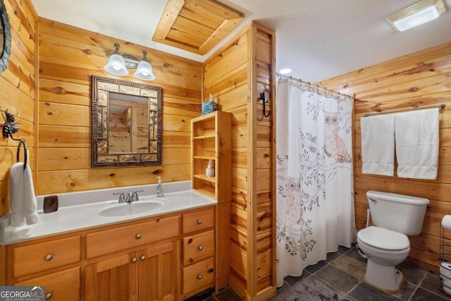 bathroom with vanity, toilet, curtained shower, and wooden walls