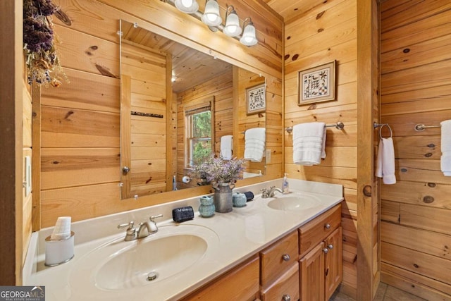 bathroom featuring vanity, wood ceiling, and wood walls