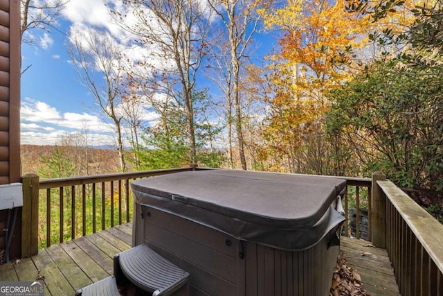 deck with a hot tub