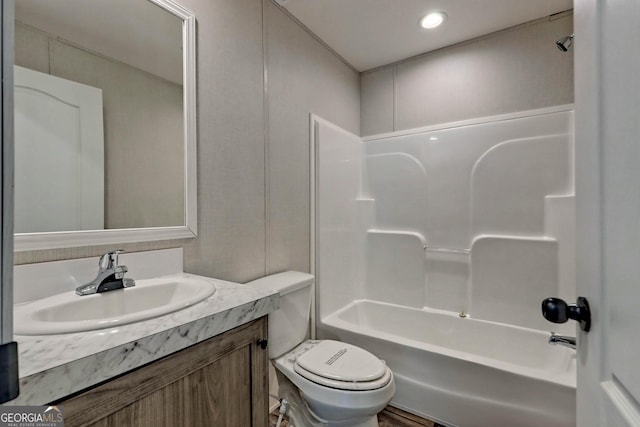 full bathroom with vanity, shower / bathtub combination, and toilet