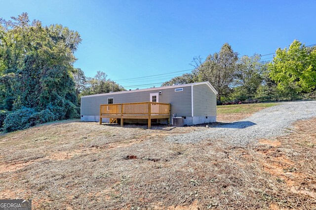 view of yard with a wooden deck