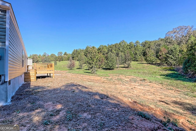 view of yard featuring a deck