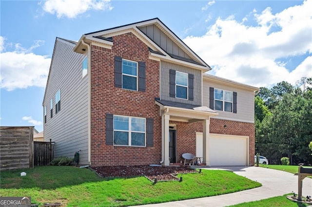 view of front of property with a front yard and a garage