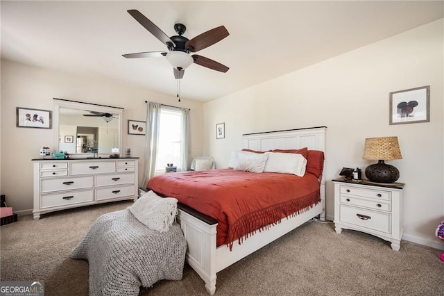 carpeted bedroom featuring ceiling fan