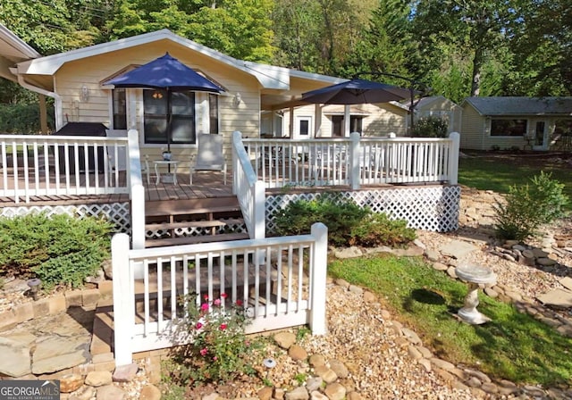 view of front facade with a deck