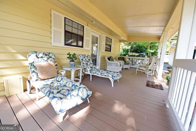 deck with covered porch