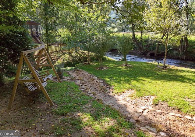 view of yard with a water view