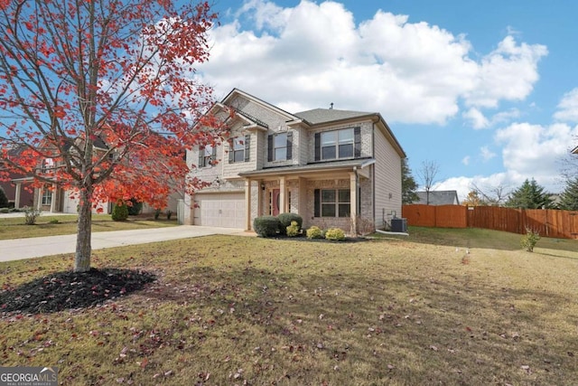 view of front of house with central AC, a front lawn, and a garage