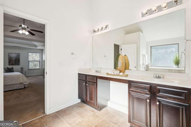 bathroom featuring ceiling fan, tile patterned flooring, and vanity