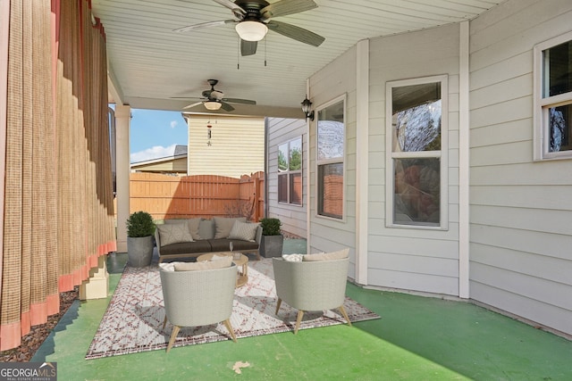 view of patio / terrace featuring ceiling fan