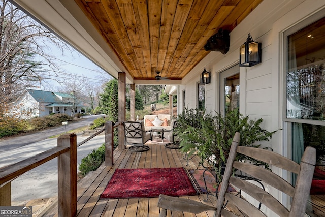 deck featuring covered porch