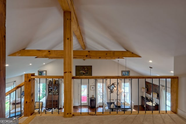 room details featuring beam ceiling and carpet flooring