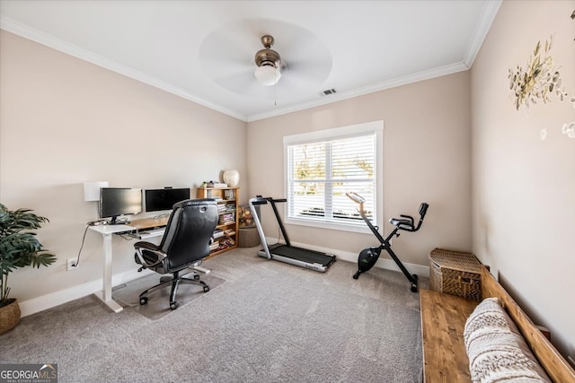 carpeted home office featuring ceiling fan and ornamental molding