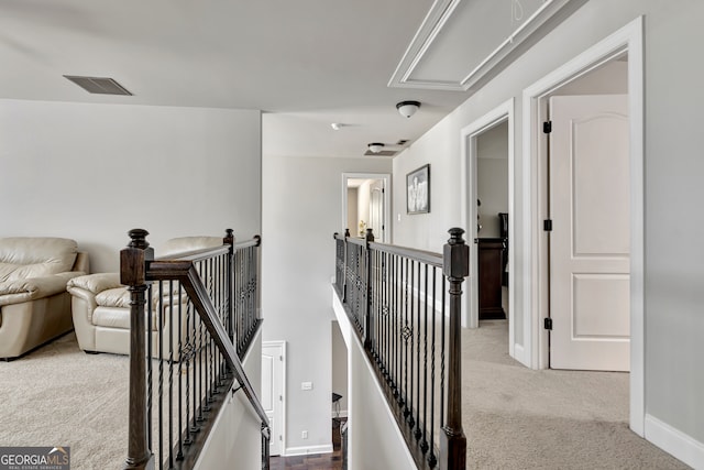 corridor with carpet floors