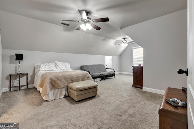 carpeted bedroom featuring ceiling fan and lofted ceiling