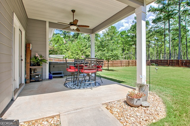 view of patio / terrace featuring ceiling fan