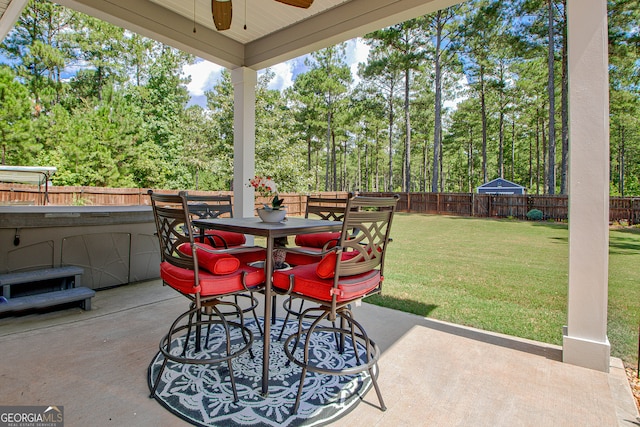 view of patio featuring ceiling fan